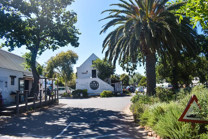 Boulders Beach Penguins Half Day Tour - Muizenberg closes the route with surf and color