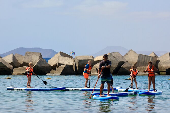 Stand Up Paddle Boarding Lesson in Playa Flamingo - From knees to standing in two hours
