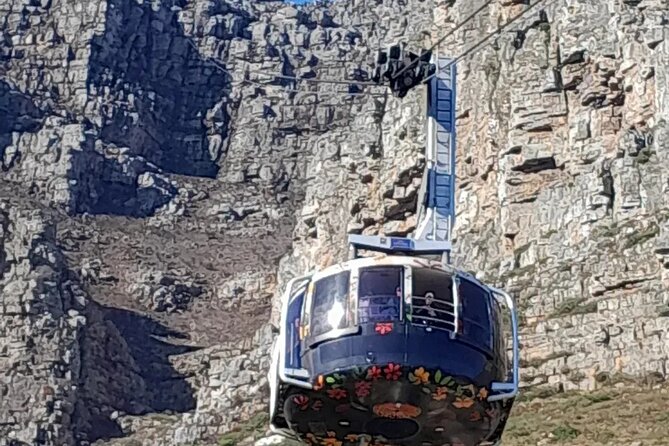 Table Mountain Cape Point Penguin Groot Constantia Private Tour - Camps Bay, Maiden’s Cove, and the Atlantic road