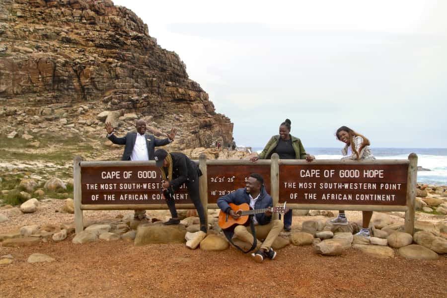 Table Mountain, Penguins & Cape of good hope full day Tour - Muizenberg finishes the return route