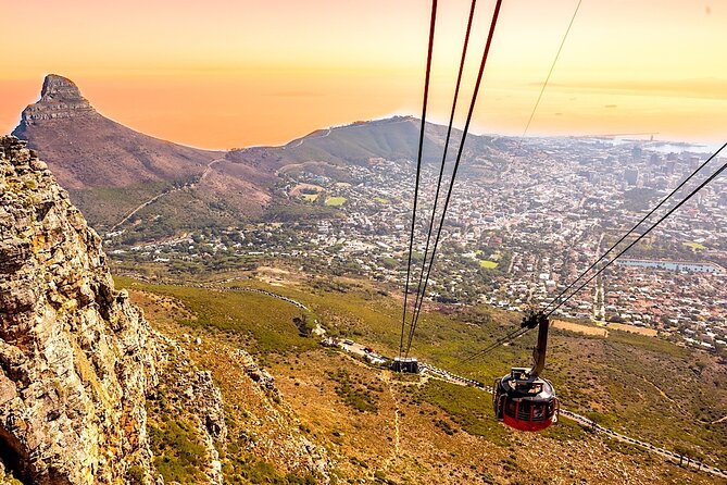 Top 10 Super Tour: Table Mountain, Penguins & Cape of Good Hope Small Group Trip - Clifton, Maidens’ Cove, and Camps Bay in postcard form